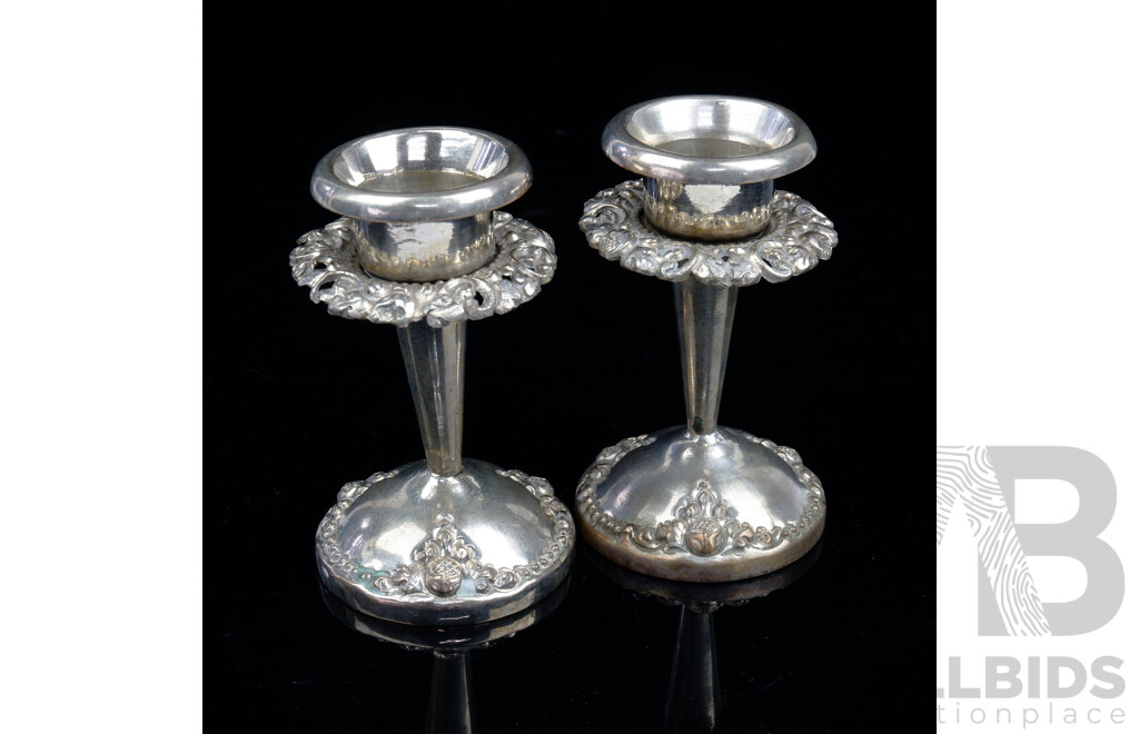 Pair of Yogyakarta Heavily Repousse Weighted .800 Silver Candlesticks
