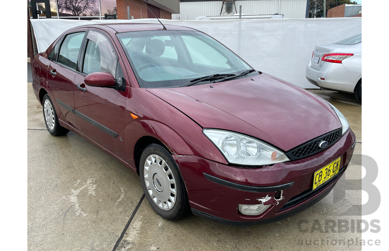 10/2004 Ford Focus CL LR 4d Sedan Red 1.8L