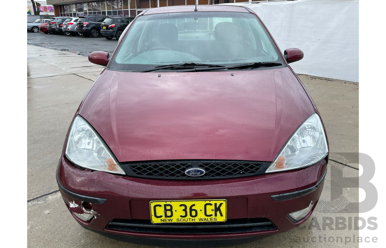 10/2004 Ford Focus CL LR 4d Sedan Red 1.8L