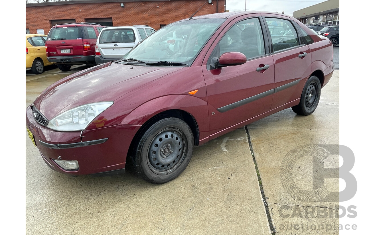 10/2004 Ford Focus CL LR 4d Sedan Red 1.8L