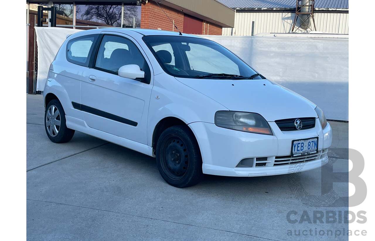 2/2006 Holden Barina  TK 3d Hatchback White 1.6L