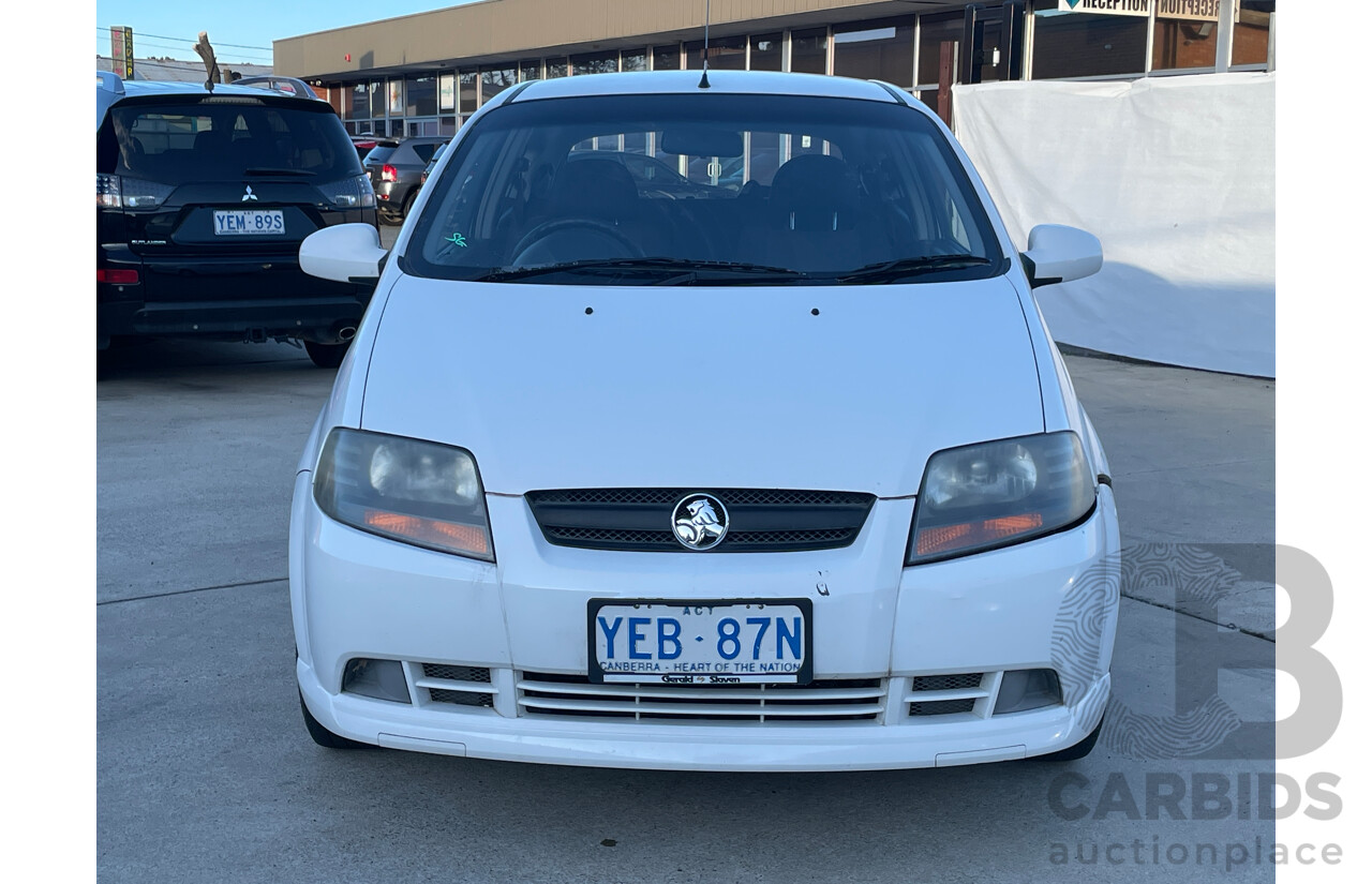 2/2006 Holden Barina  TK 3d Hatchback White 1.6L