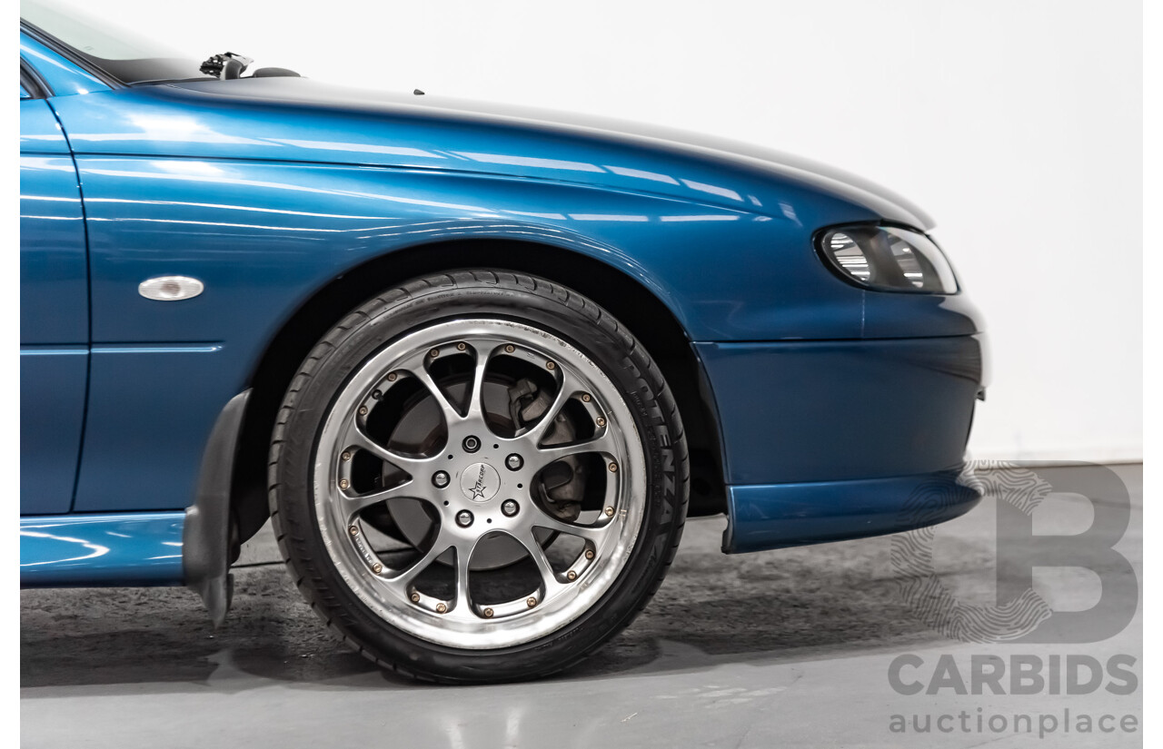 8/2002 Holden Monaro CV6 V2 2d Coupe Blue 3.8L Supercharged