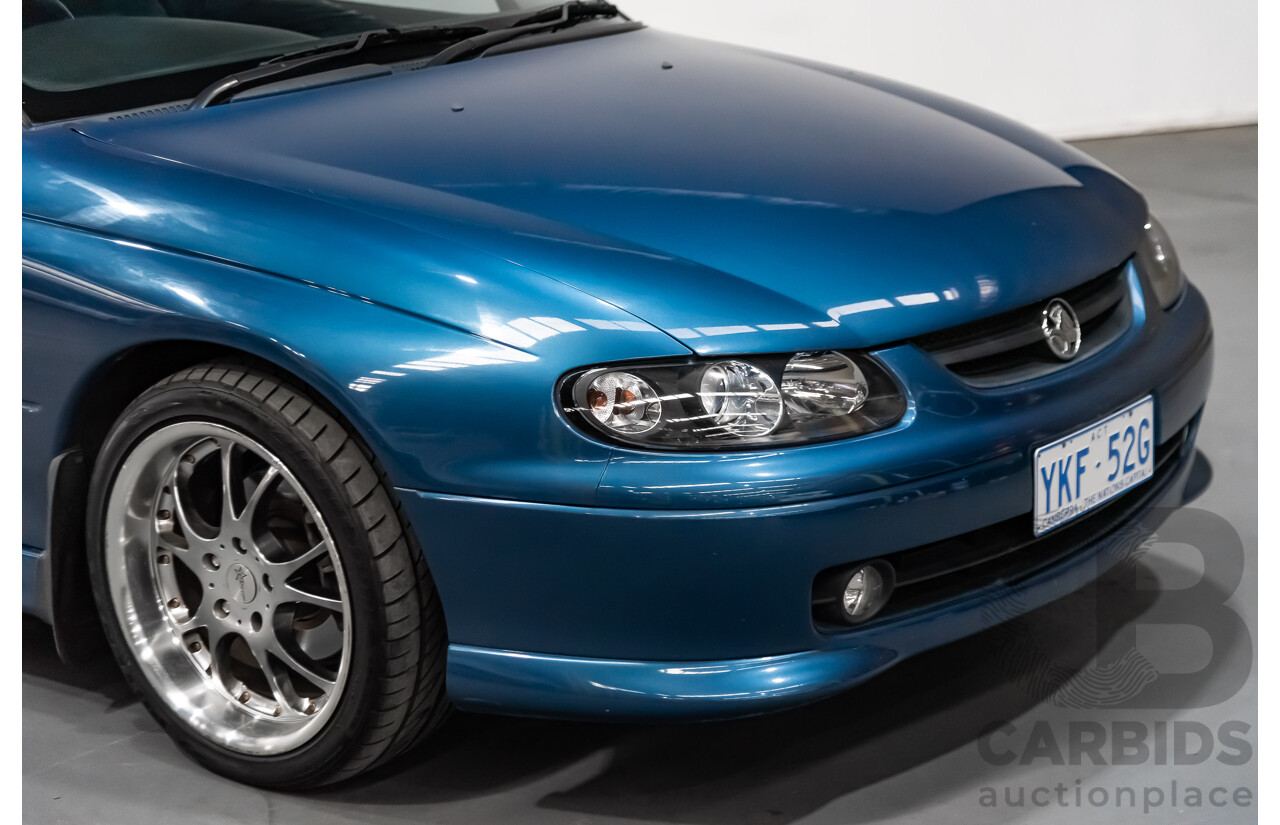 8/2002 Holden Monaro CV6 V2 2d Coupe Blue 3.8L Supercharged