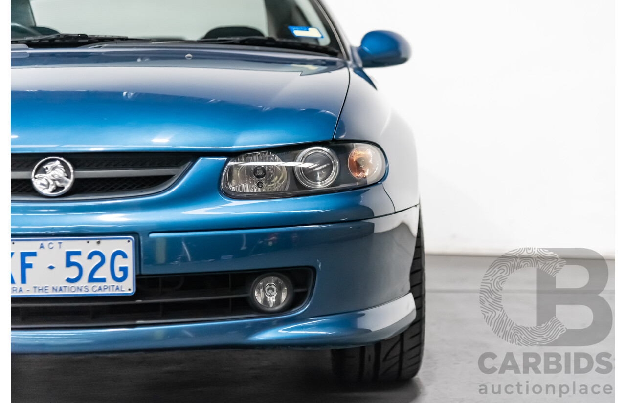 8/2002 Holden Monaro CV6 V2 2d Coupe Blue 3.8L Supercharged