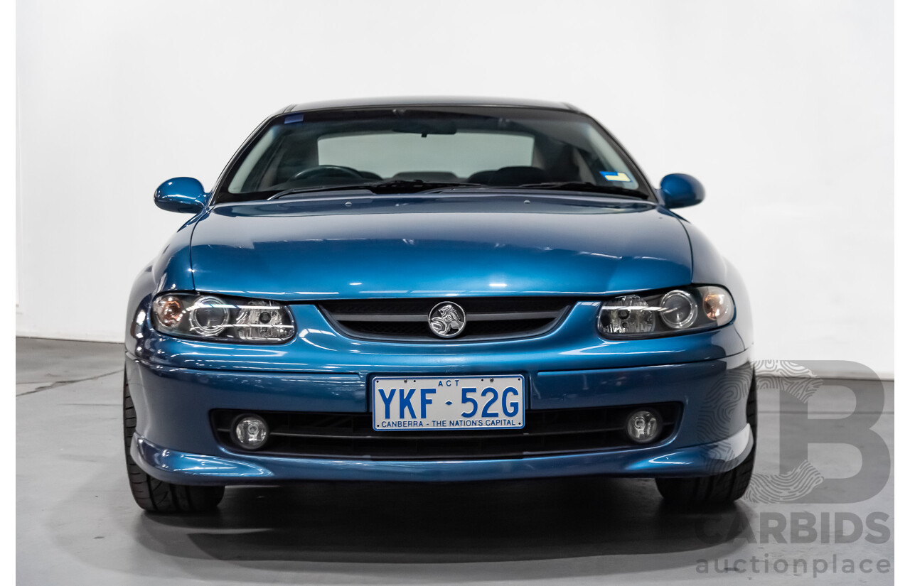 8/2002 Holden Monaro CV6 V2 2d Coupe Blue 3.8L Supercharged