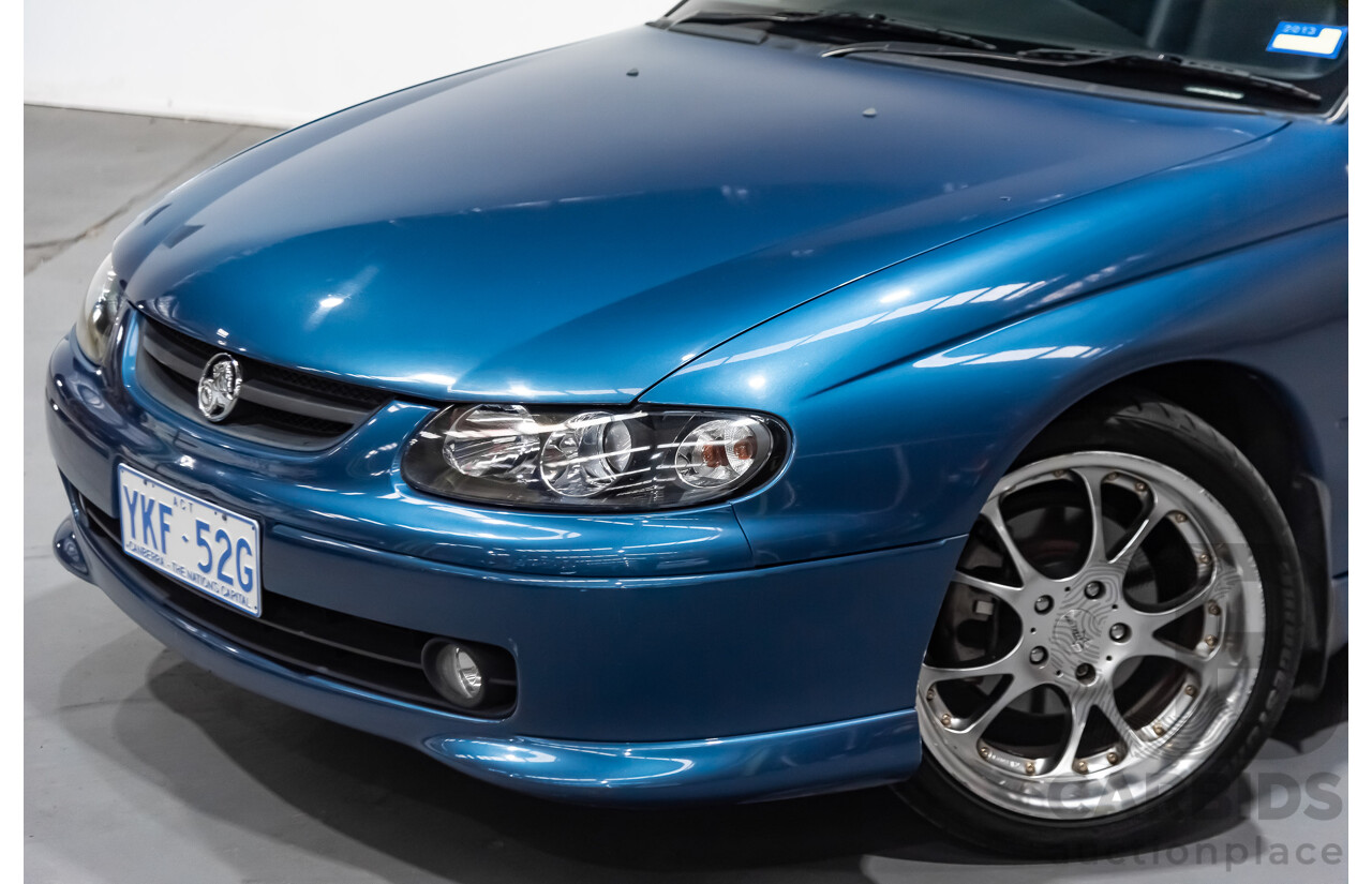 8/2002 Holden Monaro CV6 V2 2d Coupe Blue 3.8L Supercharged