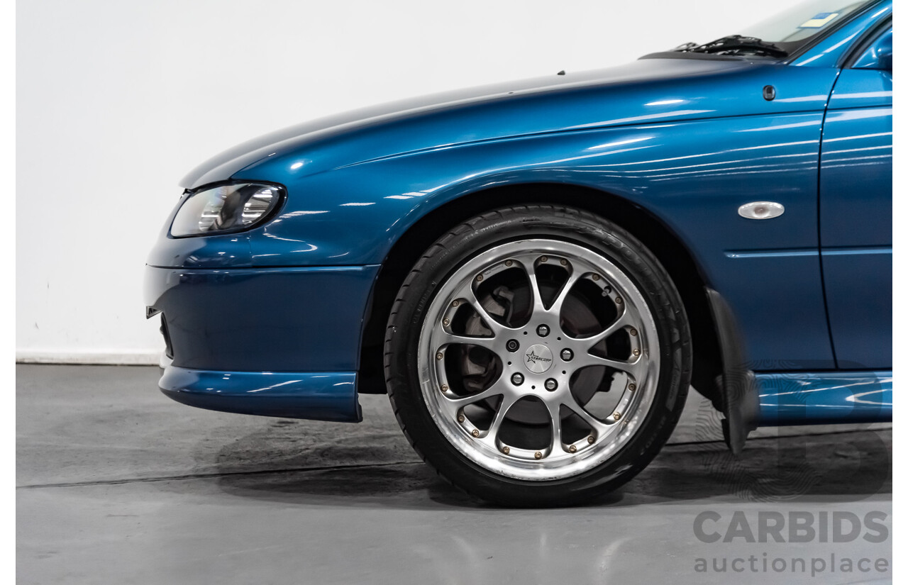 8/2002 Holden Monaro CV6 V2 2d Coupe Blue 3.8L Supercharged