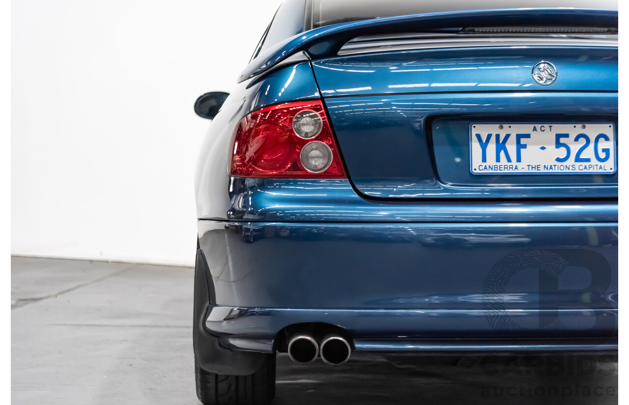 8/2002 Holden Monaro CV6 V2 2d Coupe Blue 3.8L Supercharged