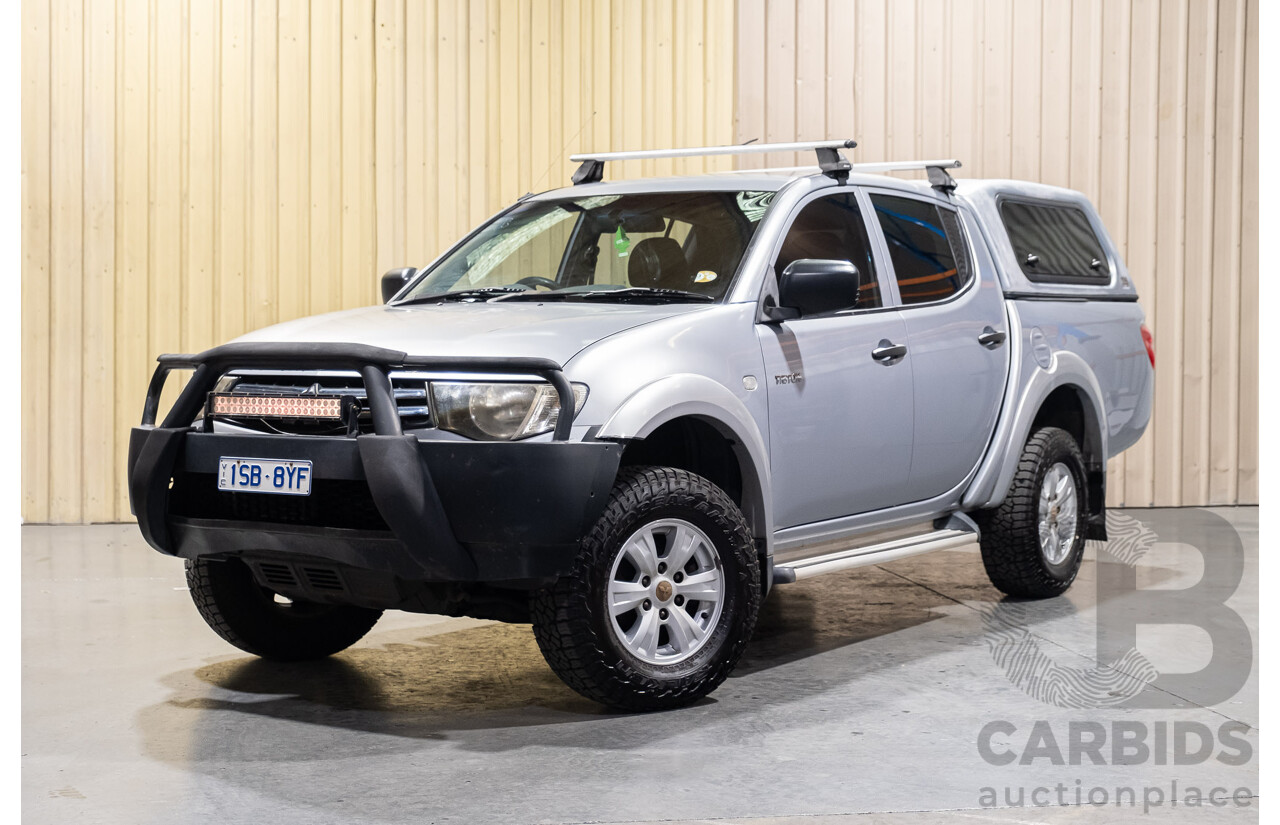 4/2011 Mitsubishi Triton GLX MN MY11 Double Cab Utility Silver Turbo Diesel 2.5L