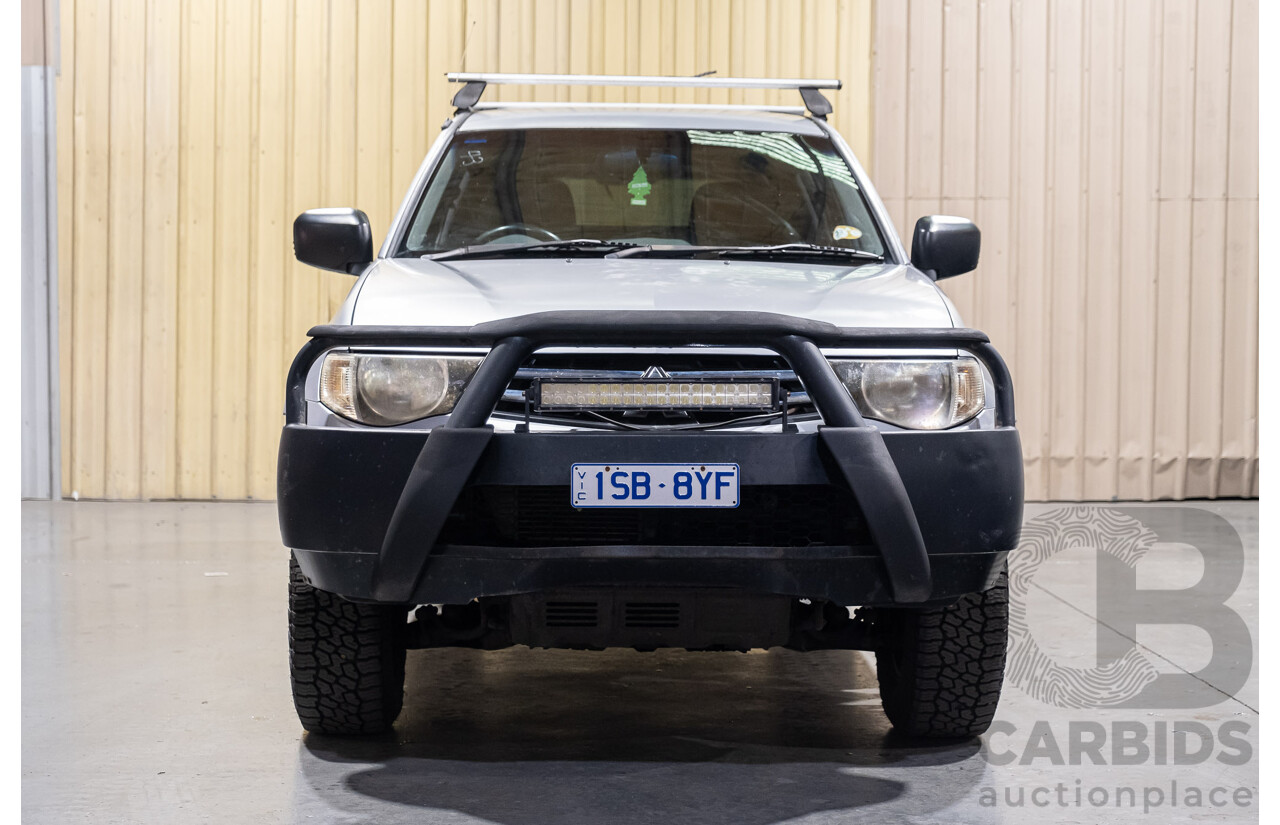 4/2011 Mitsubishi Triton GLX MN MY11 Double Cab Utility Silver Turbo Diesel 2.5L