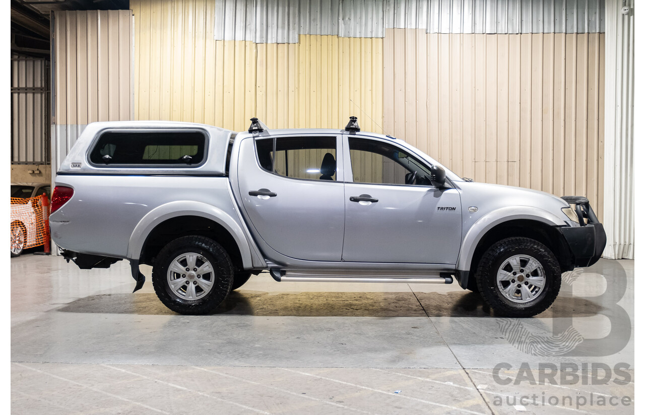 4/2011 Mitsubishi Triton GLX MN MY11 Double Cab Utility Silver Turbo Diesel 2.5L