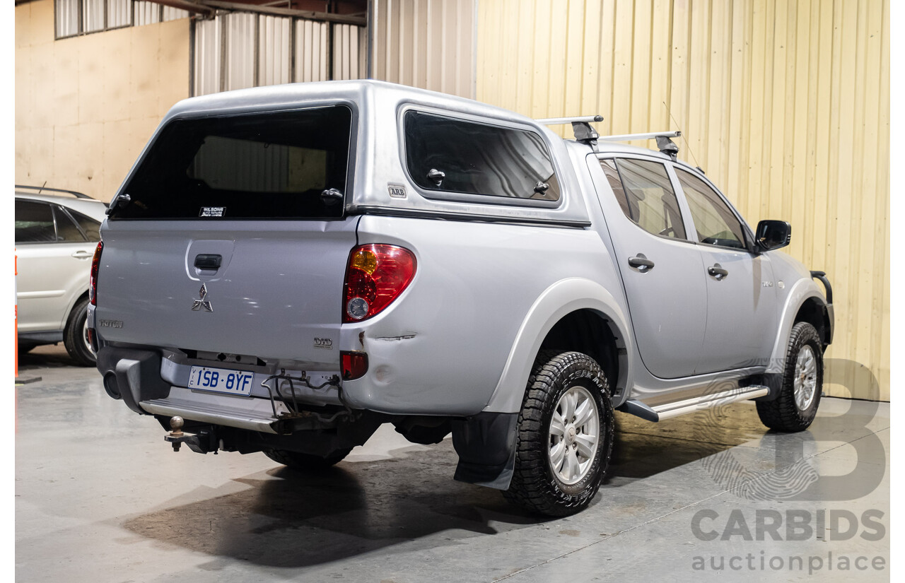 4/2011 Mitsubishi Triton GLX MN MY11 Double Cab Utility Silver Turbo Diesel 2.5L