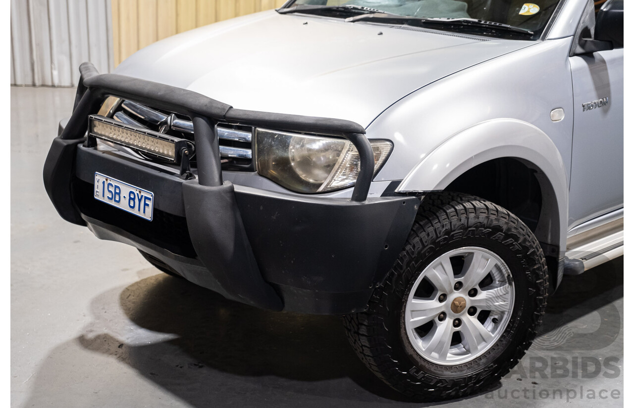 4/2011 Mitsubishi Triton GLX MN MY11 Double Cab Utility Silver Turbo Diesel 2.5L
