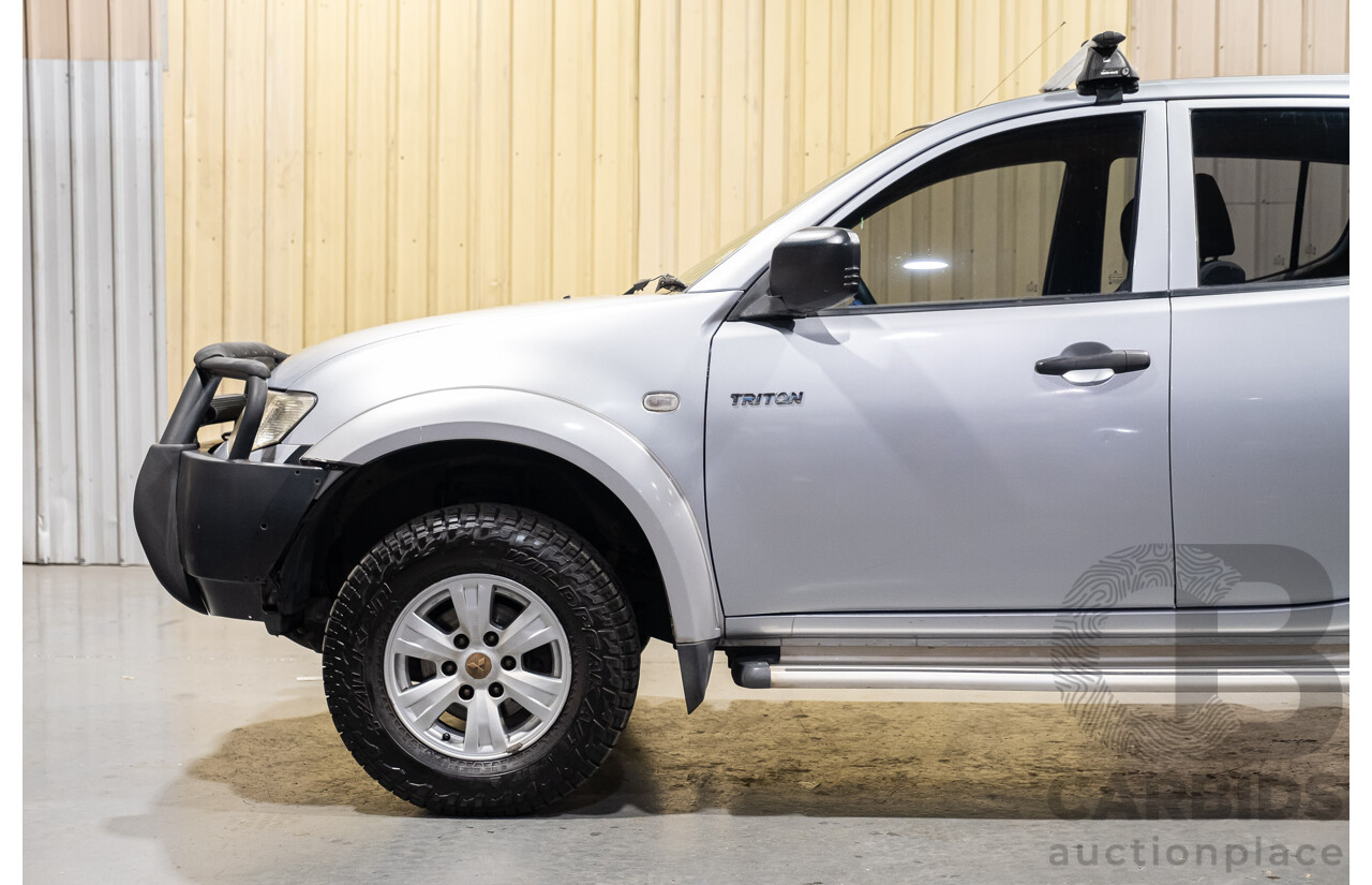 4/2011 Mitsubishi Triton GLX MN MY11 Double Cab Utility Silver Turbo Diesel 2.5L
