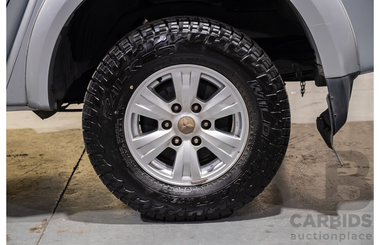 4/2011 Mitsubishi Triton GLX MN MY11 Double Cab Utility Silver Turbo Diesel 2.5L