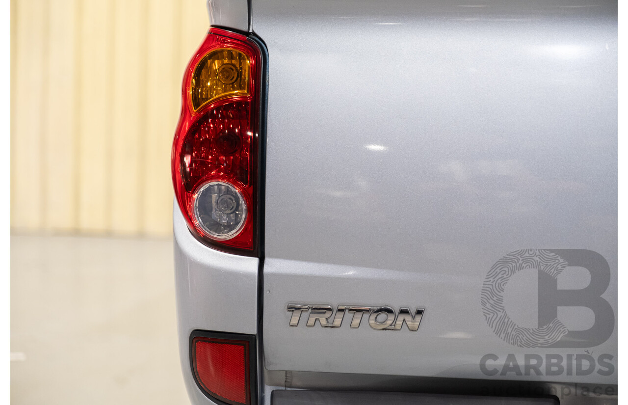 4/2011 Mitsubishi Triton GLX MN MY11 Double Cab Utility Silver Turbo Diesel 2.5L