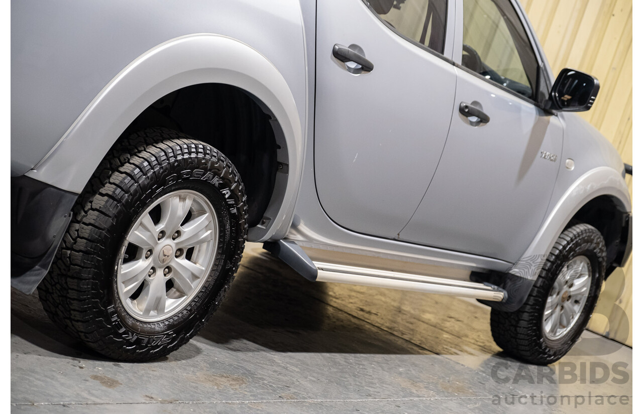4/2011 Mitsubishi Triton GLX MN MY11 Double Cab Utility Silver Turbo Diesel 2.5L