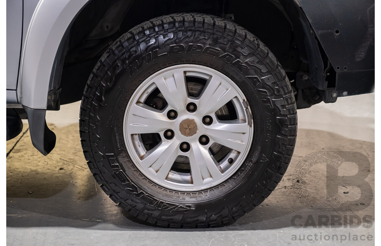 4/2011 Mitsubishi Triton GLX MN MY11 Double Cab Utility Silver Turbo Diesel 2.5L