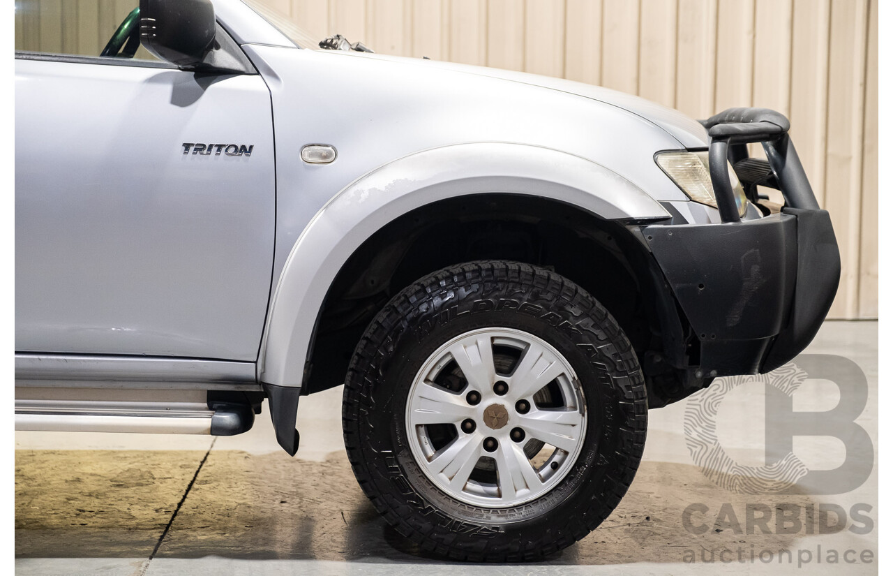 4/2011 Mitsubishi Triton GLX MN MY11 Double Cab Utility Silver Turbo Diesel 2.5L