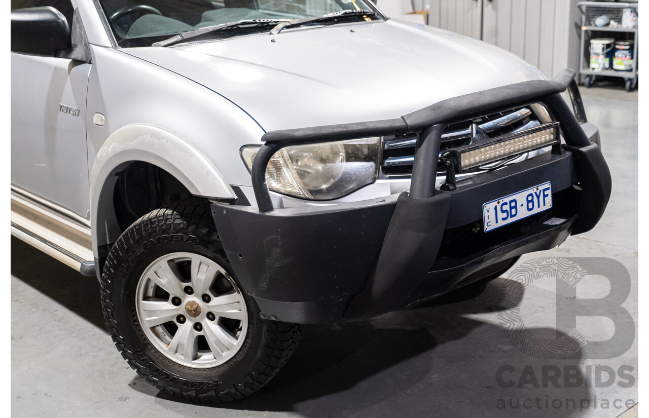 4/2011 Mitsubishi Triton GLX MN MY11 Double Cab Utility Silver Turbo Diesel 2.5L