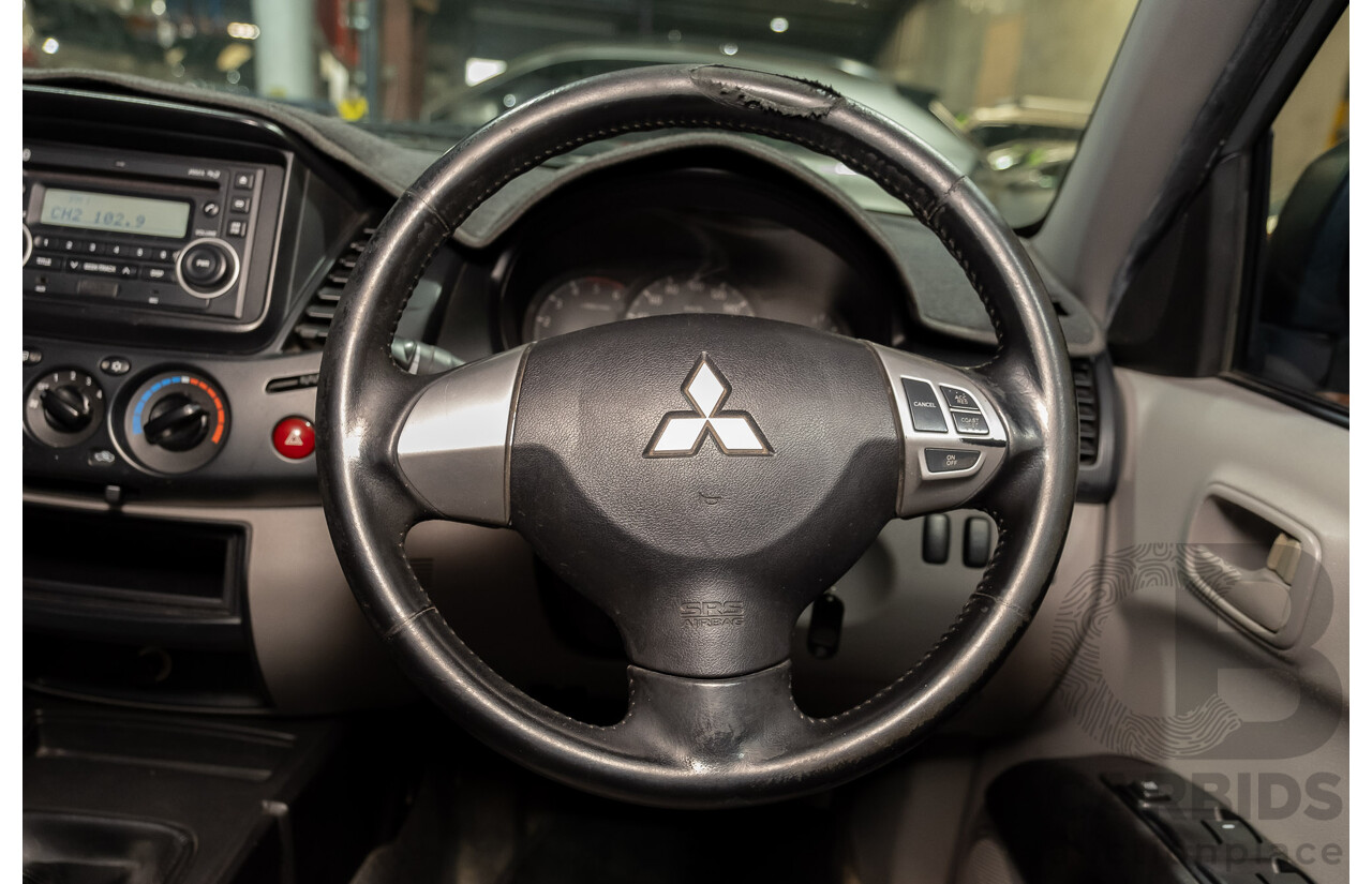 4/2011 Mitsubishi Triton GLX MN MY11 Double Cab Utility Silver Turbo Diesel 2.5L