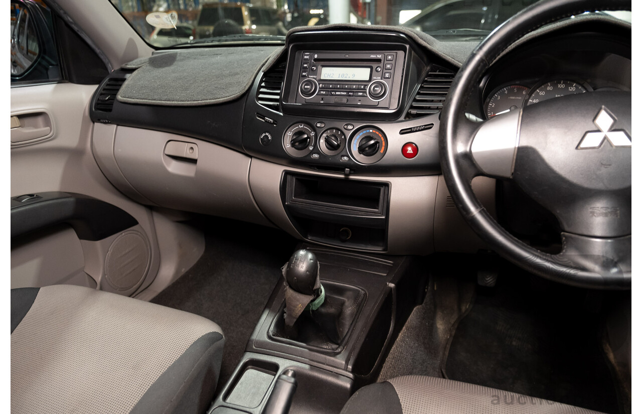 4/2011 Mitsubishi Triton GLX MN MY11 Double Cab Utility Silver Turbo Diesel 2.5L