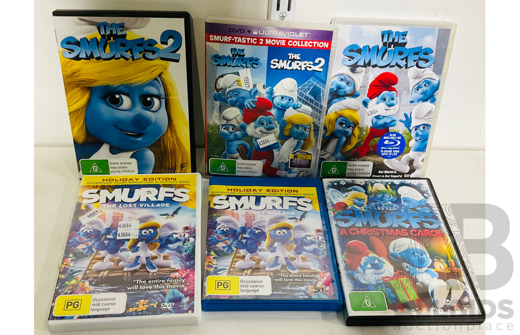 Quantity of Smurfs Including Papa Smurf, Two Puppet Smurfs and Six DVDs