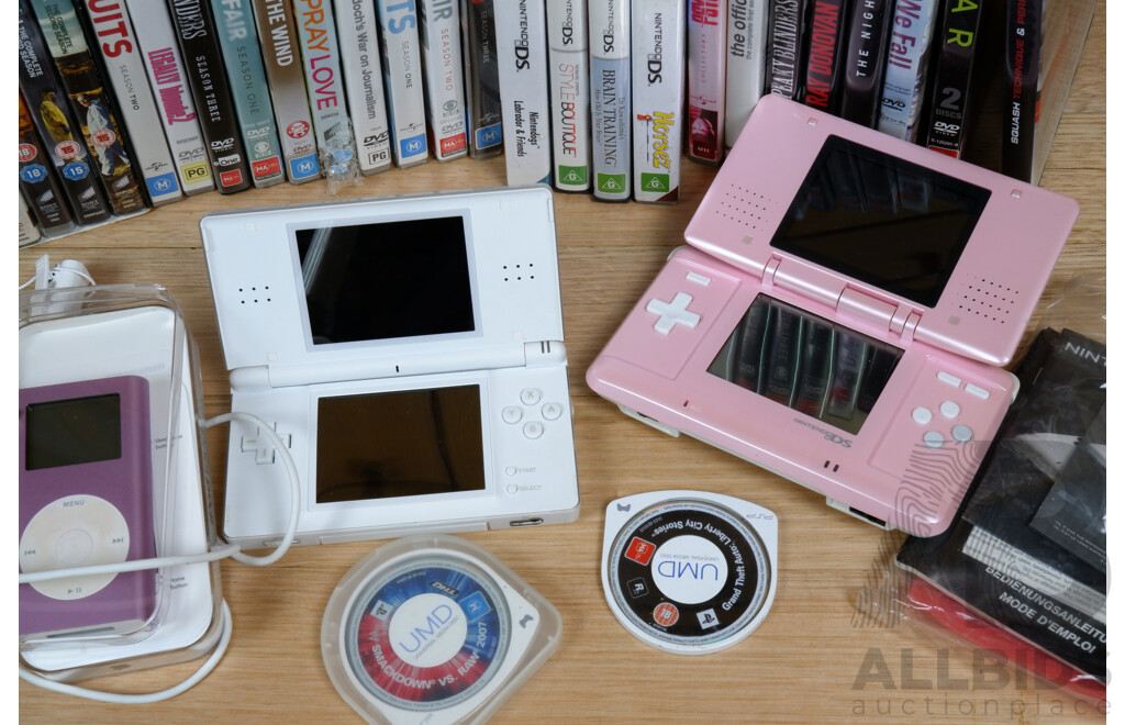 Collection of DVDs, Two Nintendo DS' and an iPod Touch