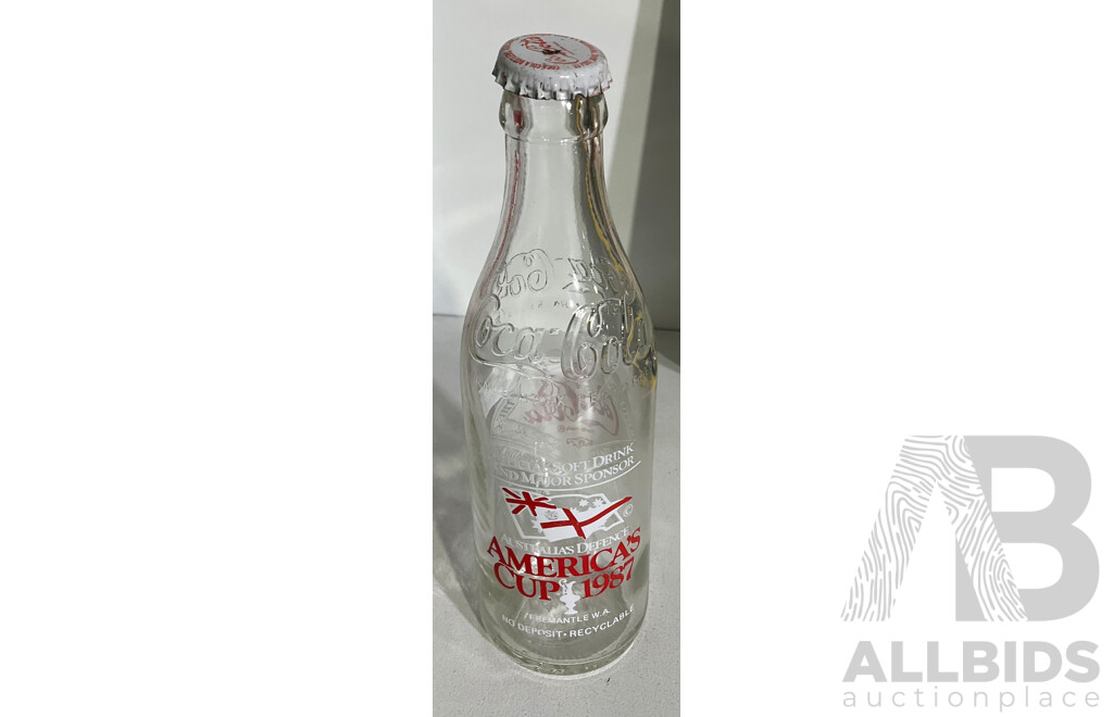 Collection of Coca-Cola Memorabilia Including Glass Bottle From the America’s Cup 1987 and More