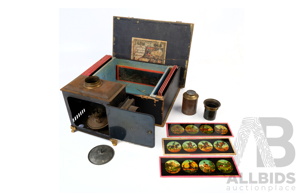 Antique German Made Magic Lantern in Original Box with 17 Glass Plates with Varied Scenes