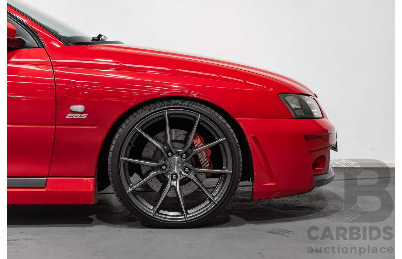 3/2004 Holden HSV Clubsport R8 VY II 4d Sedan Sting Red 5.7L - Supercharged