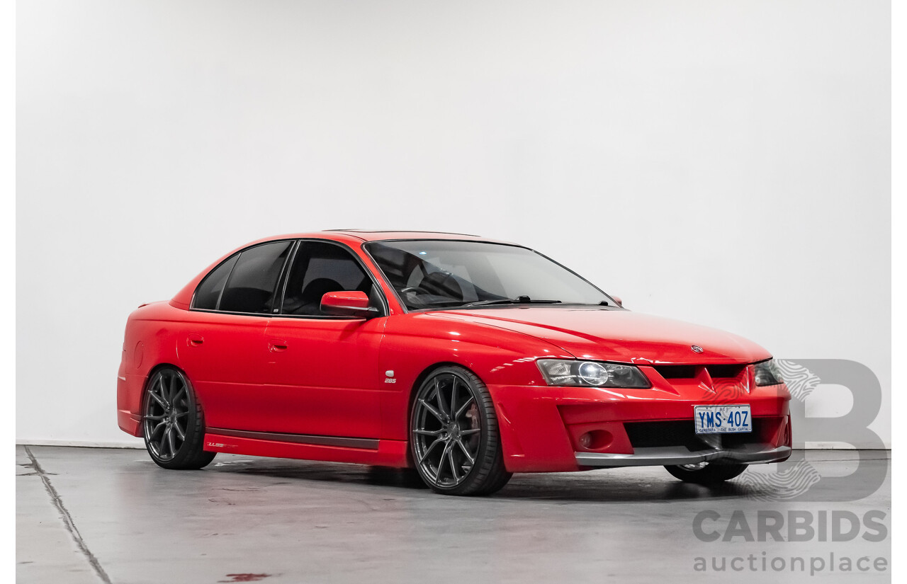 3/2004 Holden HSV Clubsport R8 VY II 4d Sedan Sting Red 5.7L - Supercharged