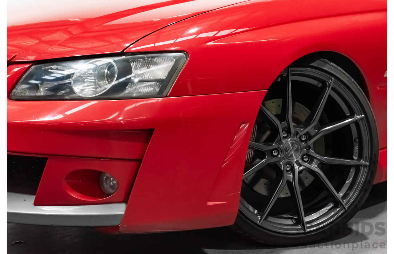 3/2004 Holden HSV Clubsport R8 VY II 4d Sedan Sting Red 5.7L - Supercharged