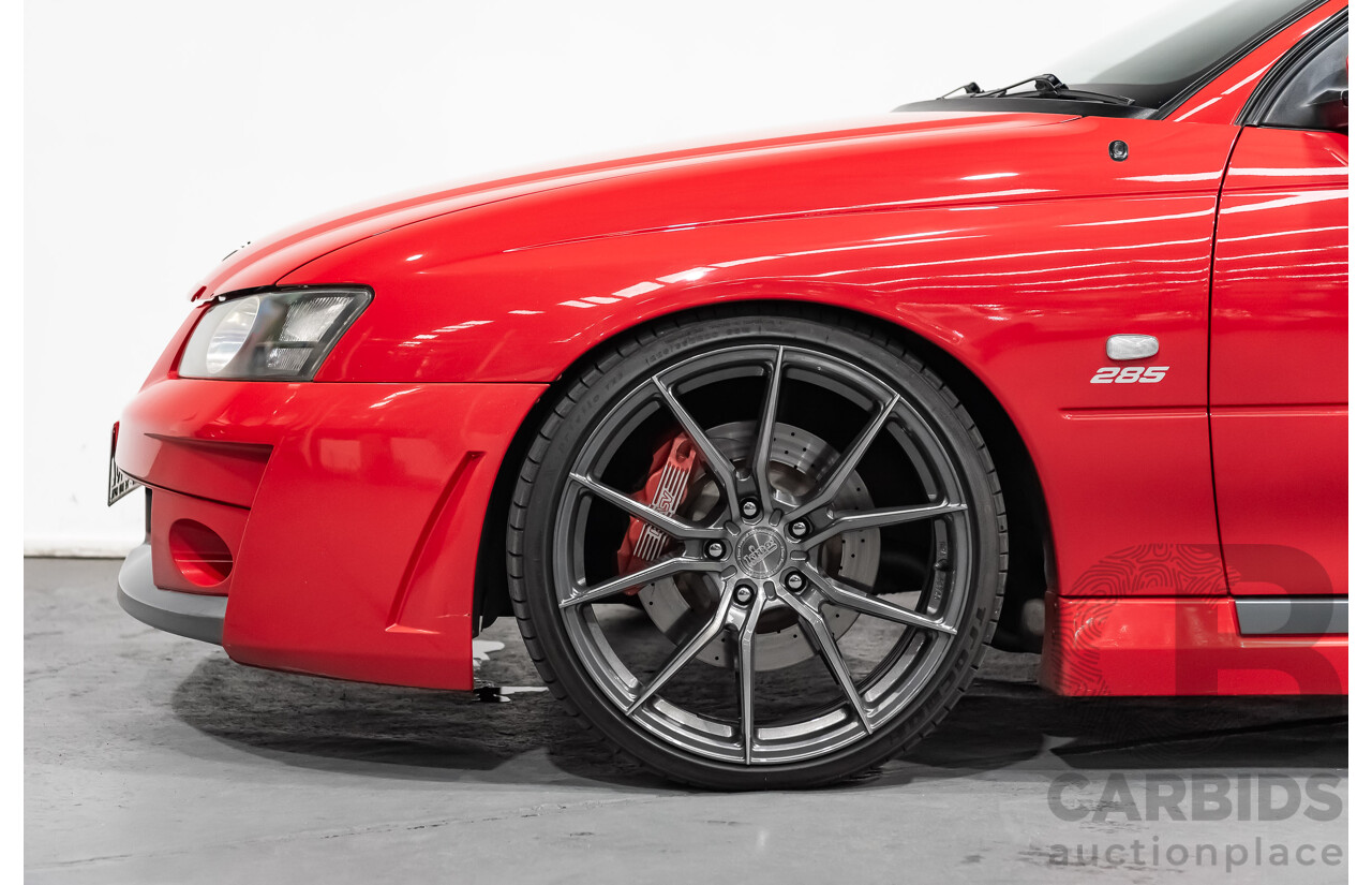 3/2004 Holden HSV Clubsport R8 VY II 4d Sedan Sting Red 5.7L - Supercharged