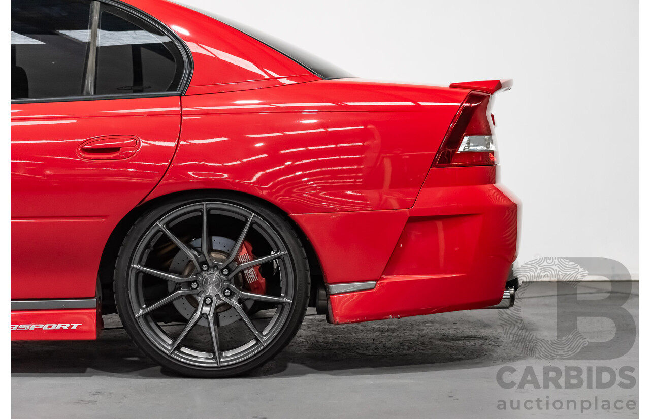 3/2004 Holden HSV Clubsport R8 VY II 4d Sedan Sting Red 5.7L - Supercharged