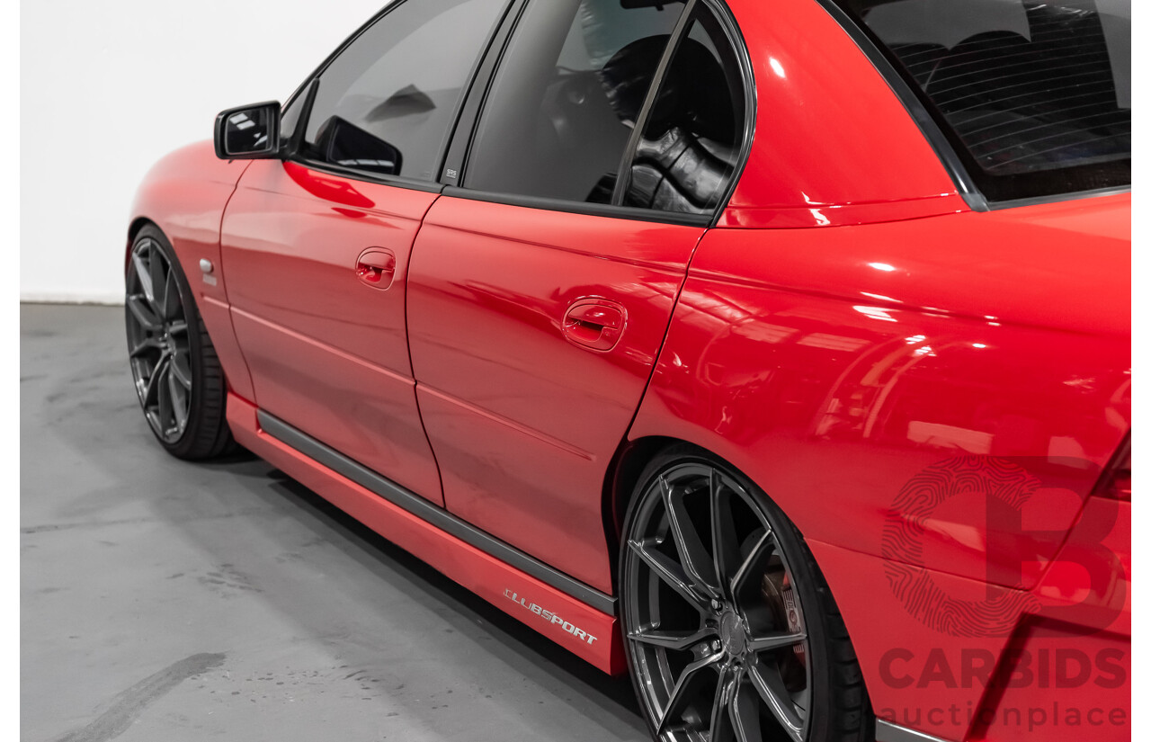 3/2004 Holden HSV Clubsport R8 VY II 4d Sedan Sting Red 5.7L - Supercharged