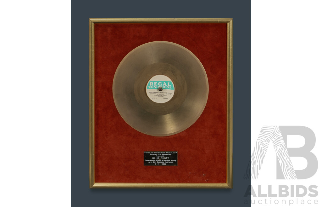 Four Slim Dusty Memorabilia Items, Includes Slim Dusty 'When the Rain Tumbles Down in July' Gold Album (45 X 37cm); Slim Dusty 99 Framed CD (55 X 40cm), 'the Very Best of Slim Dusty' Framed Presentation CD....