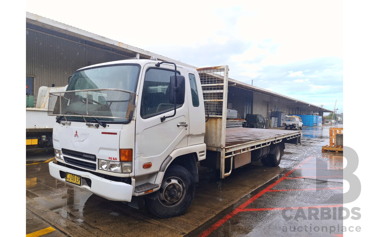 09/2004 Mitsubishi FK 600 Rigid Flat Bed Tray Truck