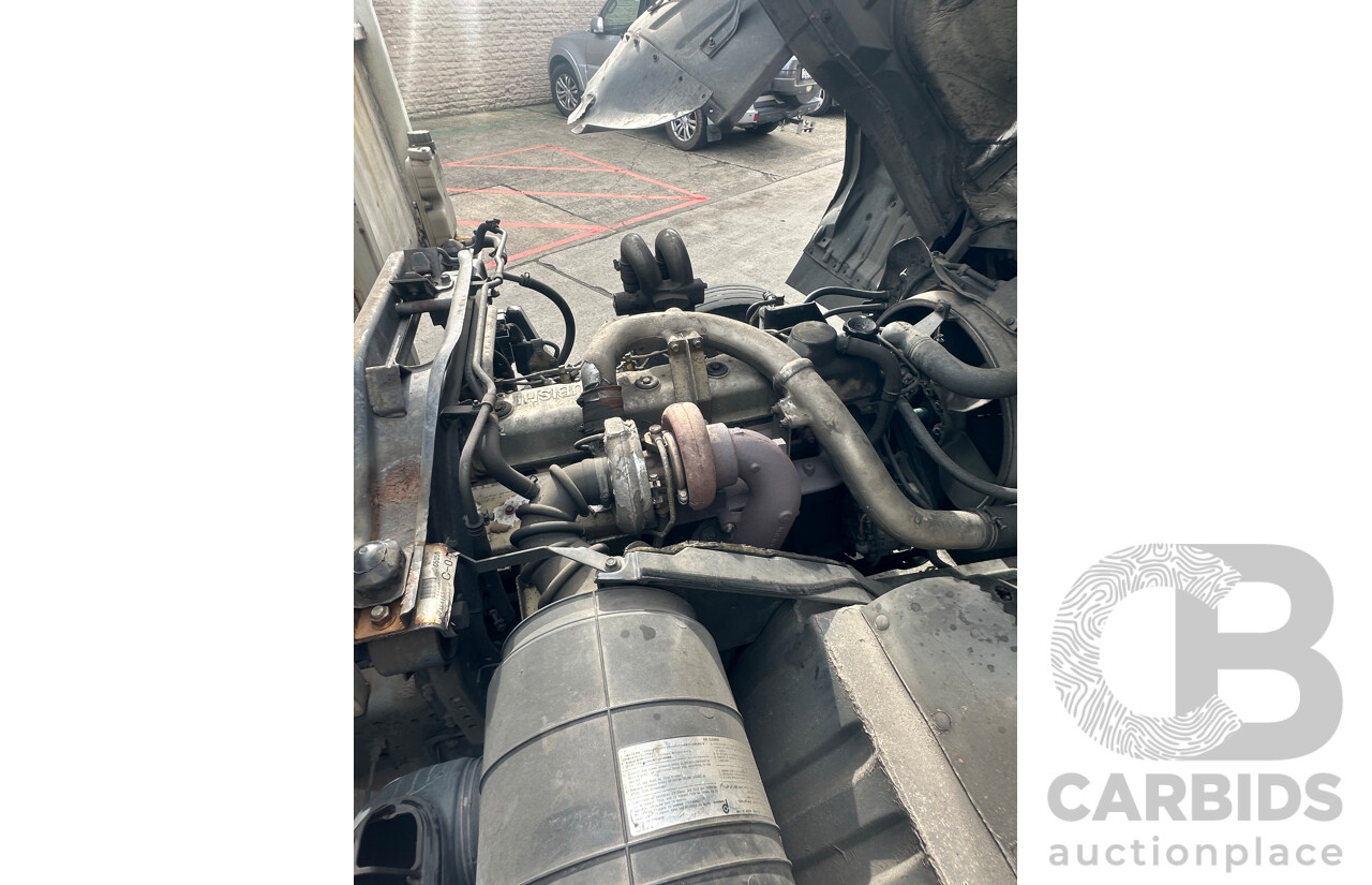 09/2004 Mitsubishi FK 600 Rigid Flat Bed Tray Truck