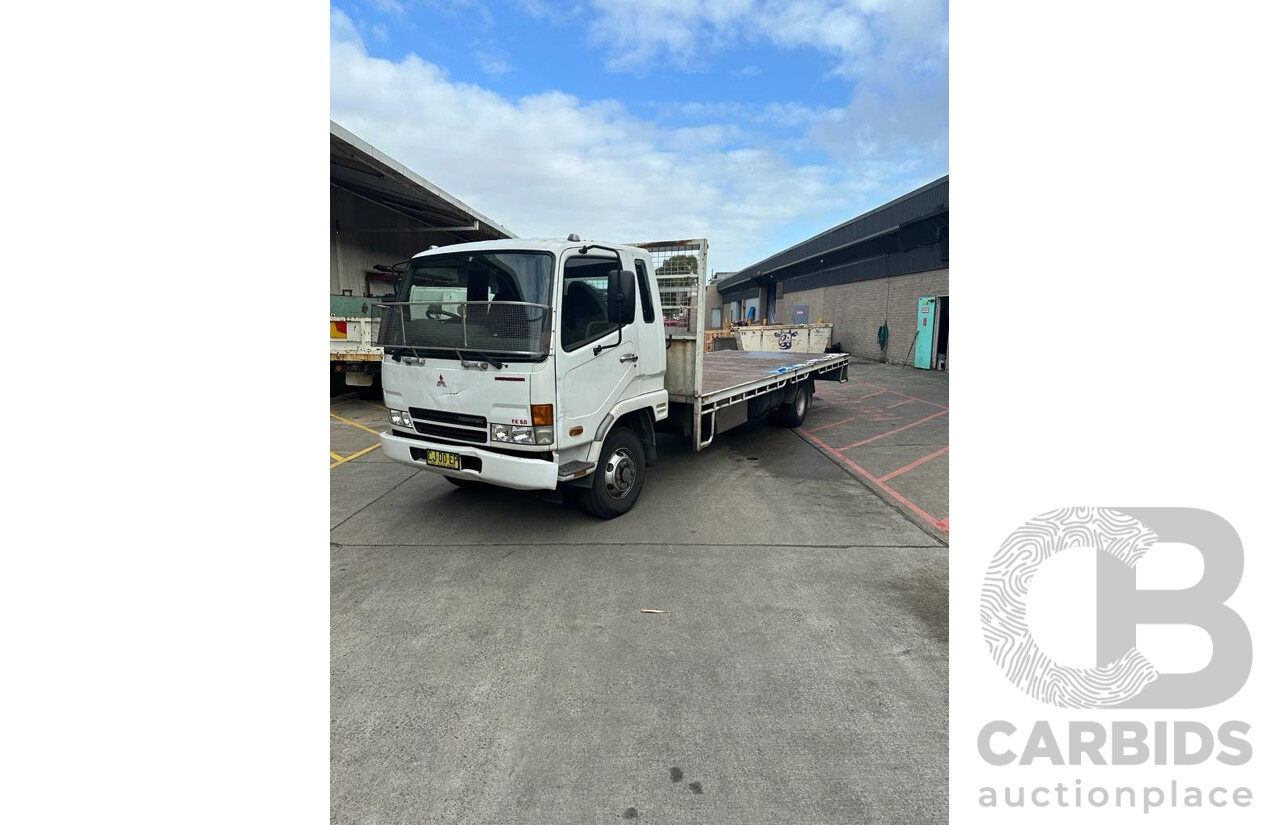 09/2004 Mitsubishi FK 600 Rigid Flat Bed Tray Truck