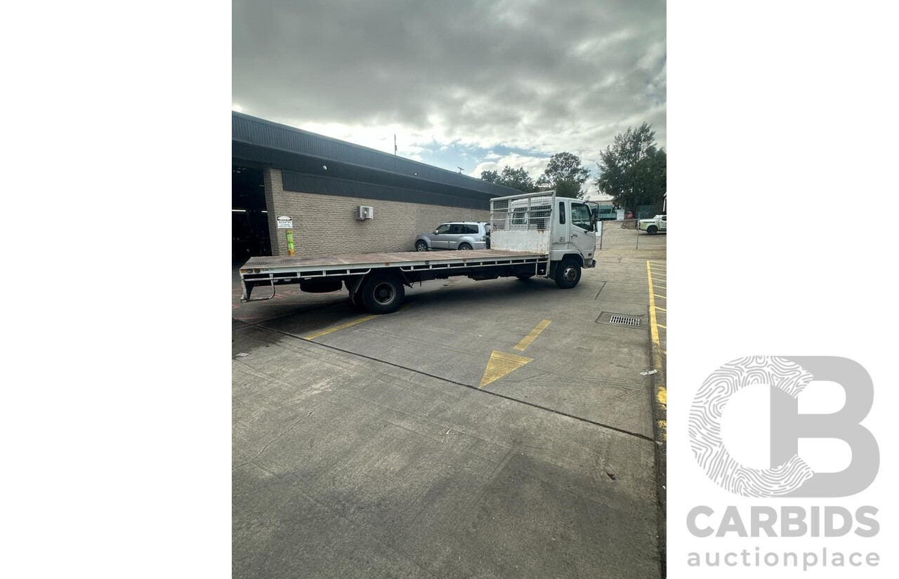 09/2004 Mitsubishi FK 600 Rigid Flat Bed Tray Truck
