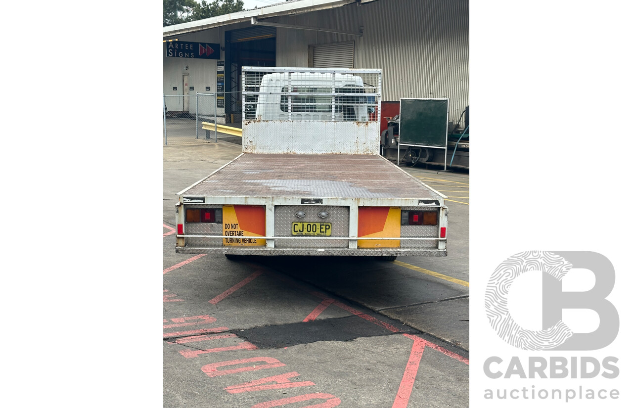 09/2004 Mitsubishi FK 600 Rigid Flat Bed Tray Truck