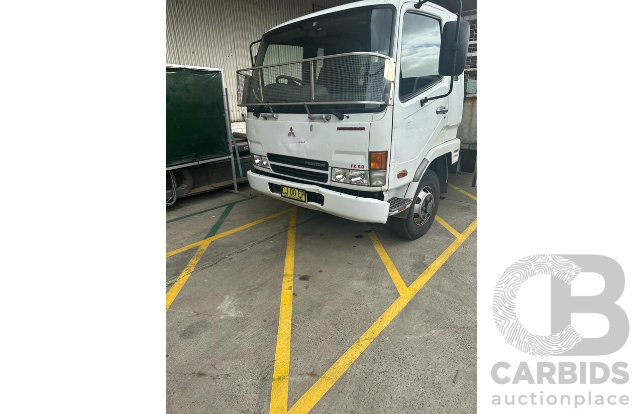 09/2004 Mitsubishi FK 600 Rigid Flat Bed Tray Truck