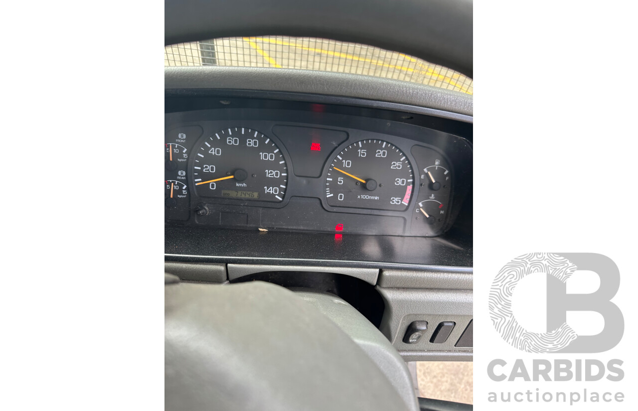 09/2004 Mitsubishi FK 600 Rigid Flat Bed Tray Truck