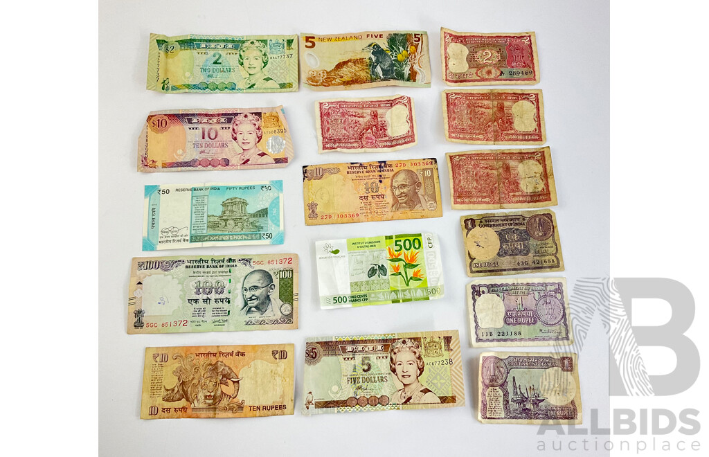 Collection of International Bank Notes Including India, Fiji, New Zealand and More