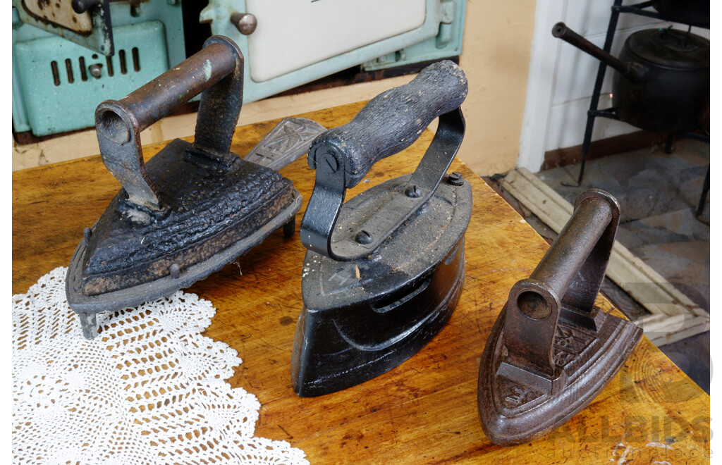 Three Antique Irons, One with Trivet 