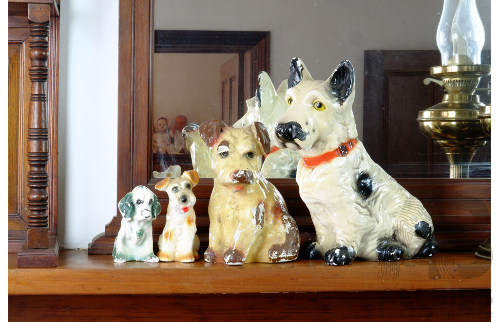 Four Vintage Painted Composite Dogs