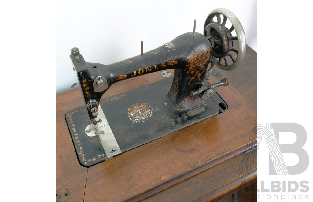 Antique Jones Sewing Machine on Oak Treadle Sewing Table