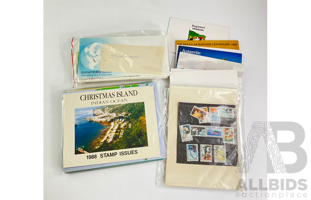 Collection of International Stamp Packs From Papua New Guinea, Nauru, Keeling Islands, United Kingdom and More